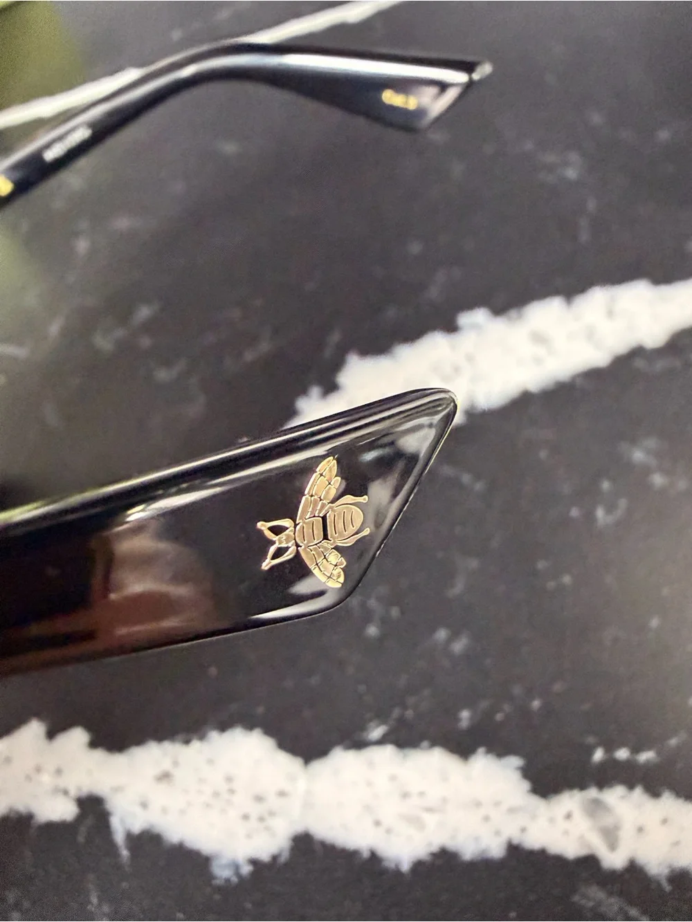 Gucci Black Frame Sunglasses with Gradient Purple Lenses